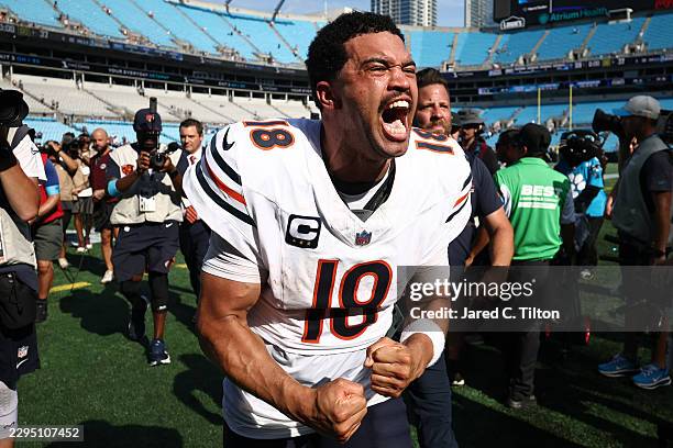 Caleb Williams of the Chicago Bears celebrates after their 59-37 win against the Carolina Panthers of the game at Bank of America Stadium on...