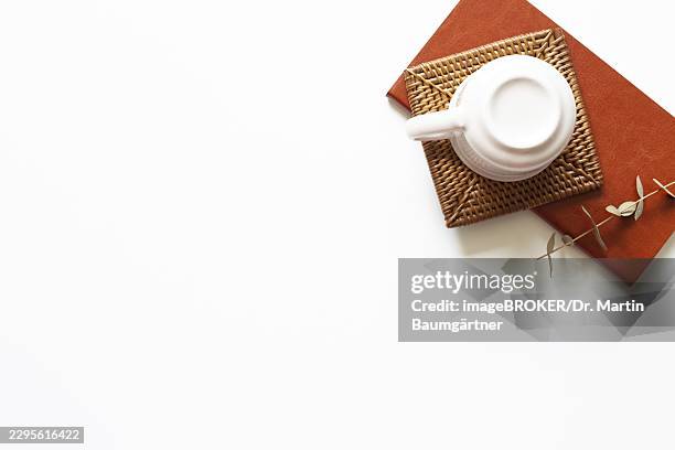 office desk. notebook and cup on white background. top view, copy space - coaster isolated stock pictures, royalty-free photos & images