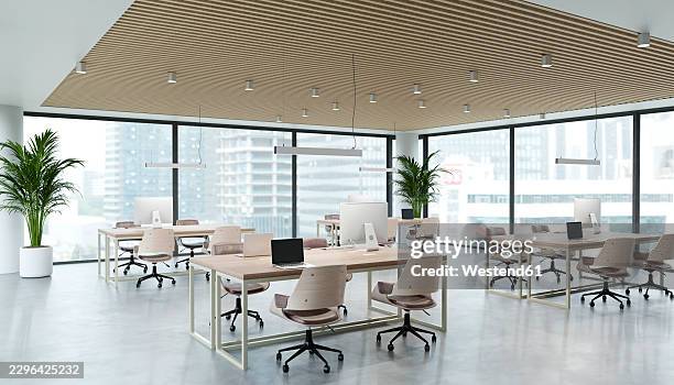 modern open office features empty workspace and large window - open plan office stock illustrations