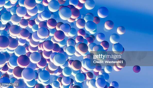 abstract blue spheres float dynamically in a modern 3d rendering - floating particles stock illustrations