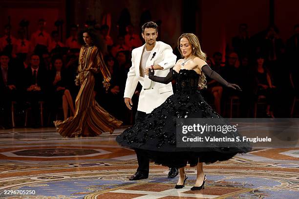 Lorenzo Musetti and Jennifer Lopez walk the runway during Vogue World: Milano 2026 at Galleria Vittorio Emanuele II on September 22, 2026 in Milan,...