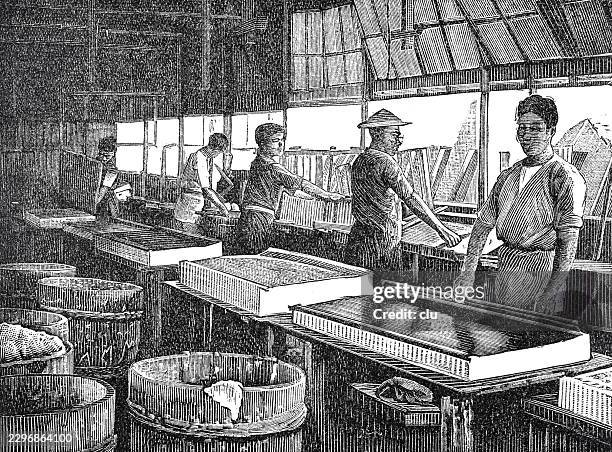 japanese papermaking workshop — several papermakers work side by side at large vats, moving rectangular moulds through the fiber pulp to produce handmade paper sheets - paper industry stock illustrations