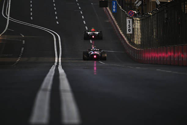 Liam Lawson of New Zealand driving the Visa Cash App Racing Bulls VCARB 03 RB Ford leads Franco Colapinto of Argentina driving the Alpine F1 A526...