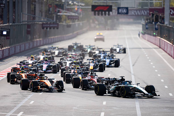 George Russell leads during the race start of the Formula 1 Qatar Airways Azerbaijan Grand Prix 2026 at the Baku City Circuit.