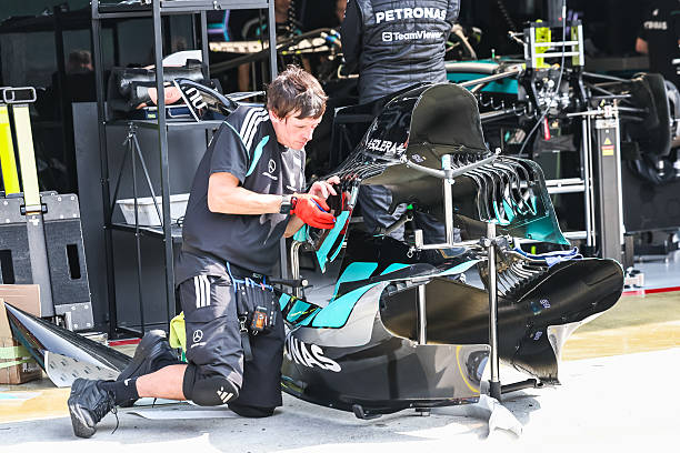 Team mechanic of Mercedes-AMG PETRONAS F1 Team work on a car ahead of the Formula 1 Gulf Air Bahrain Grand Prix on October 01, 2026 held at Sepang...
