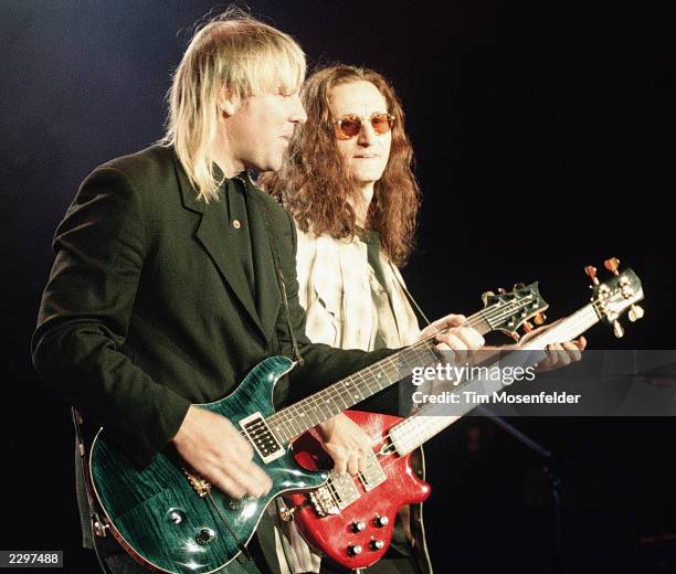 Alex Lifeson and Geddy Lee, of Rush, performing at Shoreline Amphitheater in Mountain View, Calif. On March 31st 1992 Image By: Tim...