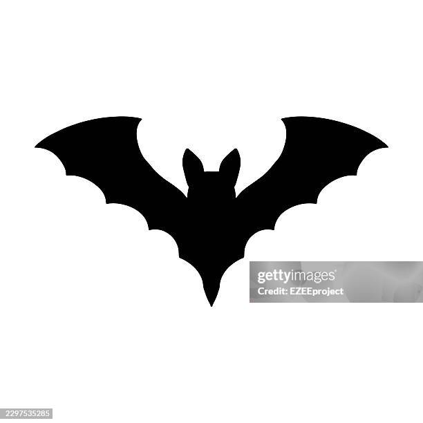 black bat silhouette with spread wings. halloween flying bat vector silhouette. spooky bat icon with open wings. black vampire bat shape for halloween - devil wings stock illustrations