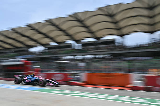 Alpine's Argentine driver Franco Colapinto steers his car during the first practice session ahead of the Formula One Bahrain Grand Prix in Sepang on...