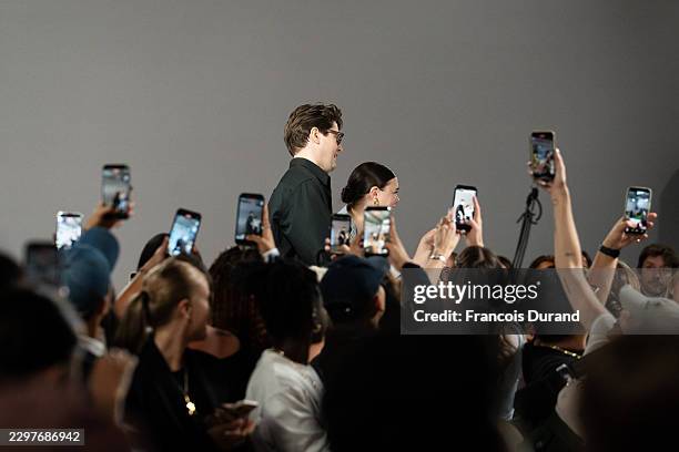 Fashion designers Ester Manas and Balthazar Delepierre walk the runway during the Ester Manas Womenswear Spring/Summer 2027 show as part of Paris...