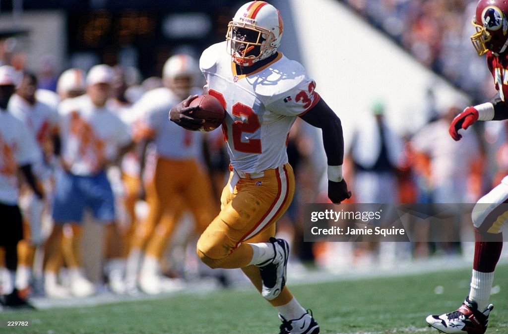 Ericht Rhett Running back Errict Rhett of the Tampa Bay Buccaneers carries the ...