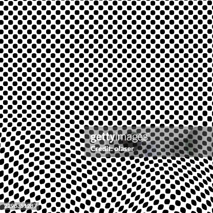 Black oval dots form a dense repeating pattern on a white background, with the lower portion warping into a curved wave-like distortion. Black oval dots form a dense repeating pattern on a white background, with the lower portion warping into a curved wave-like distortion.