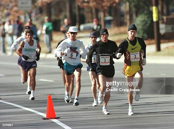 Runner Bob Kempainen of Minnetonka, Minnesota, takes the lead in the Olympic Men''s Marathon Trials held in Charlotte, North Carolina. Just behind...
