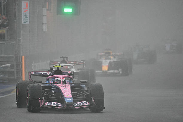 Alpine's Argentine driver Franco Colapinto steers his car during the sprint race ahead of the Formula One Singapore Grand Prix at the Marina Bay...