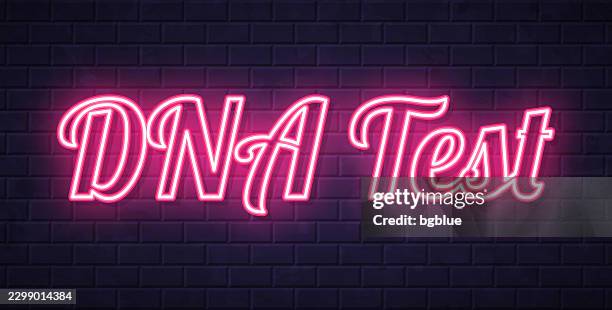 dna test - glowing neon text on brick wall background - dna test stock illustrations