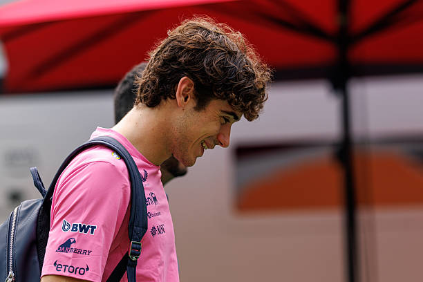 Franco Colapinto of Argentina and Alpine F1 Team walks in the paddock during previews ahead of the F1 Grand Prix of Singapore at Marina Bay Street...