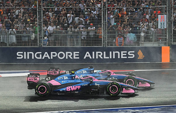 Pierre Gasly of France driving the Alpine F1 A526 Mercedes and Franco Colapinto of Argentina driving the Alpine F1 A526 Mercedes battle for track...