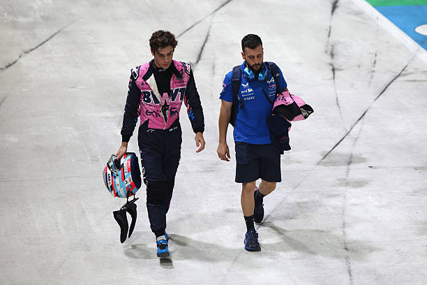 Sixteenth placed qualifier Franco Colapinto of Argentina and Alpine F1 walks in the Pitlane after being eliminated during qualifying ahead of the F1...