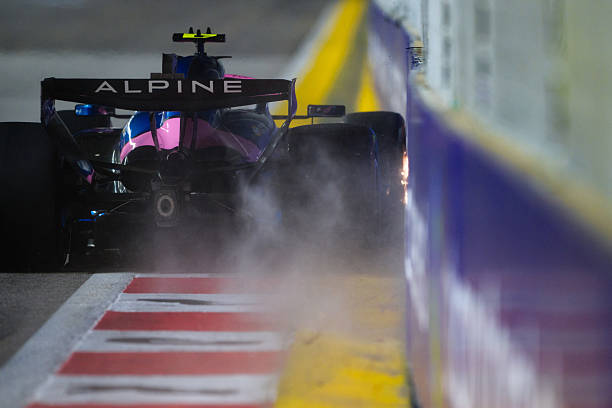 Franco Colapinto of Argentina driving the Alpine F1 A526 Mercedes scrapes the wall on track during qualifying ahead of the F1 Grand Prix of Singapore...