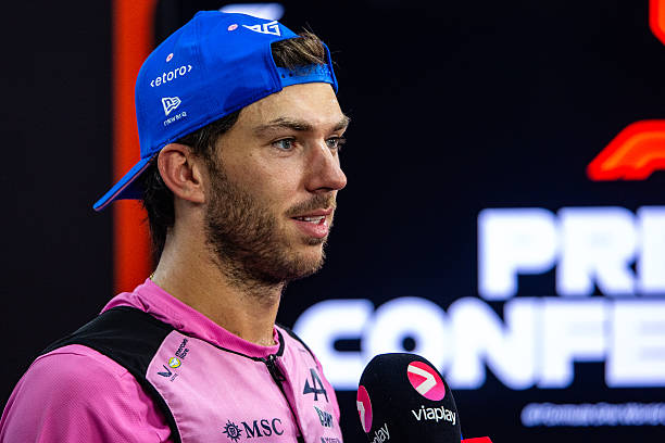 Pierre Gasly of France and Alpine F1 Team answers questions in the TV media pen during Qualifying ahead of the F1 Grand Prix of Singapore at Marina...
