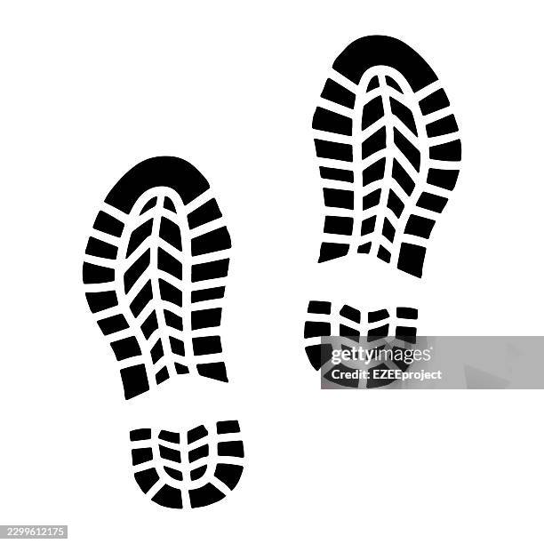 black boot footprints. shoe sole print silhouette set of two footsteps. hiking boot track prints for outdoor and adventure design. walking footprints sole texture - path logo stock illustrations