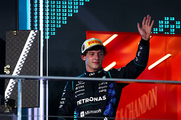 Third placed Andrea Kimi Antonelli of Italy and Mercedes AMG Petronas F1 Team celebrates on the podium during the F1 Grand Prix of Singapore at...