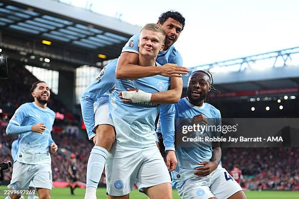 Erling Haaland of Manchester City celebrates scoring their first goal with Matheus Nunes during the Premier League 2026/27 match between Liverpool FC...