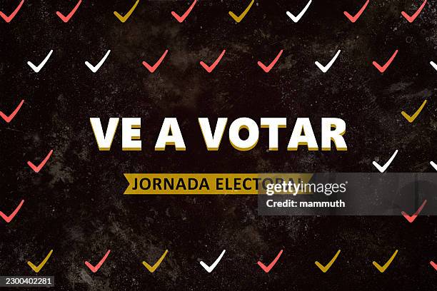 ve a votar spanish message displayed with checkmarks on dark background, political election in spain - i voted stock illustrations