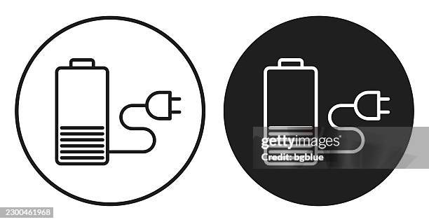 battery charging. round icon - black and white circle button - black plug socket stock illustrations