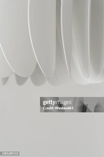 abstract white overlapping lamellas with soft shadows and copy space - vertical blinds stock illustrations
