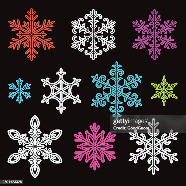 decorative snowflake collection on black background - filigree pattern stock illustrations