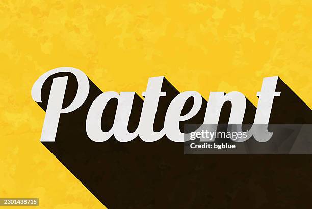 patent - text with long shadow on textured yellow background - patent background stock illustrations