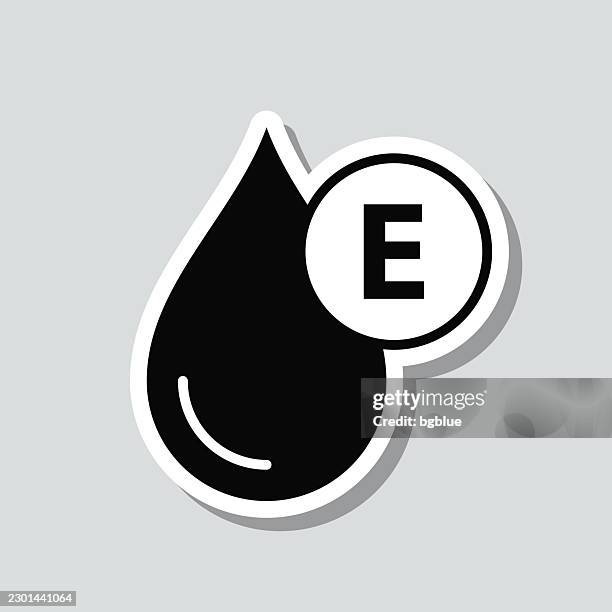 vitamin e liquid drops. icon sticker on gray background - vitamin e stock illustrations