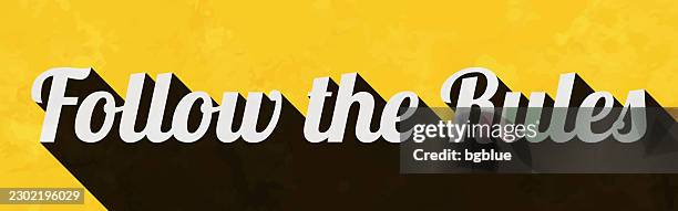 follow the rules - text with long shadow on textured yellow background - gritty texture background stock illustrations