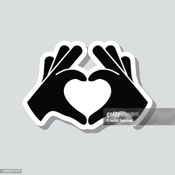 heart hands. icon sticker on gray background - heart hands stock illustrations