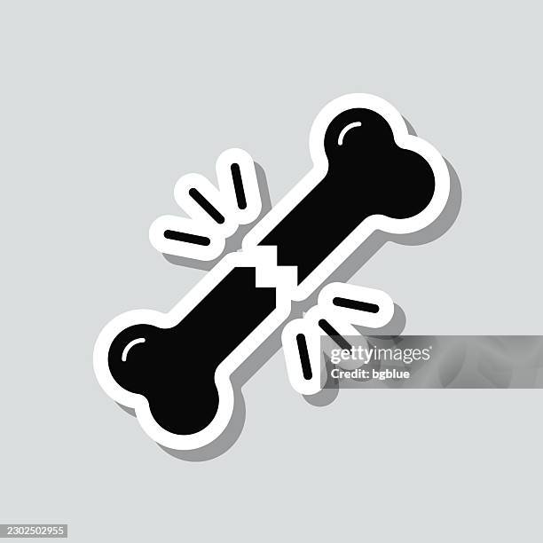 bone fracture. icon sticker on gray background - splint stock illustrations