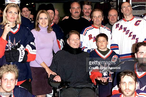 Christopher Reeve with wife Dana and son Will, in a group photo including Kim Alexis, Rod Gilbert and Mark Messier at the Superskate 2001 charity...