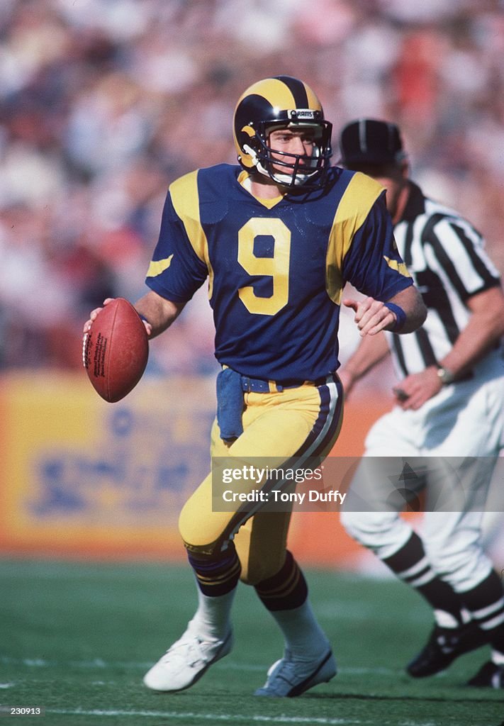 Jeff Kemo Rams Quarterback Jeff Kemp of the Los Angeles Rams roles out to pass... News ...