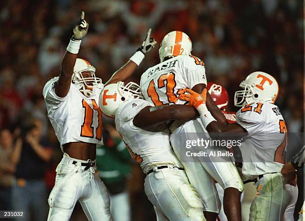 TENNESSEE PLAYERS CELEBRATE AFTER WIDE RECEIVER MARCUS NASH SCORED HIS SECOND TOUCHDOWN AGAINST ALABAMA DURING THE SECOND QUARTER OF THE VOLUNTEERS...