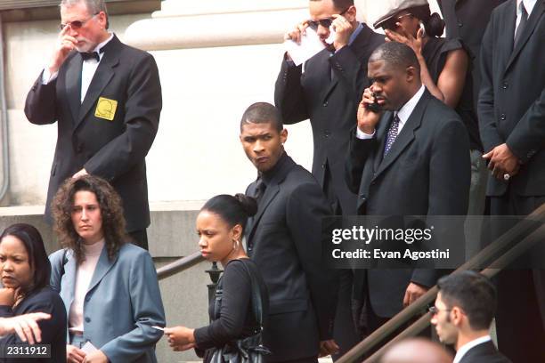 Singer Usher leaving R & B singer Aaliyah's memorial service at St. Ignatius Loyola Roman Catholic Church in New York City. 8/31/2001. Photo: Evan...