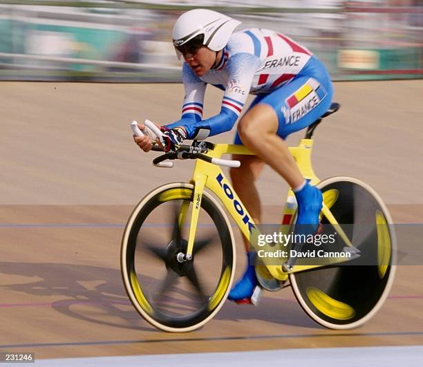 Marion Clignet of France in action during the womens individual pursuit qualifiers at the Stone Mountain Velodrome at the 1996 Centennial Olympic...