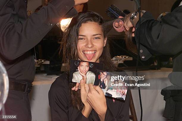 Adriana Lima backstage in hair and make-up before the Victoria's Secret Fashion Show 2001 at Bryant Park in New York City. . Photo: Evan...