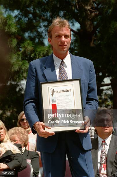 Quarterback Joe Montana a one time Kansas City Chief and a San Francisco 49er poses for a picture during his retirement ceremony in April. Mandatory...