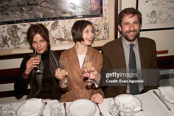 Actress Laura Morante, dinner host Isabella Rossellini and director Nanni Moretti share a toast at the screening after-party for "The Son's Room" at...