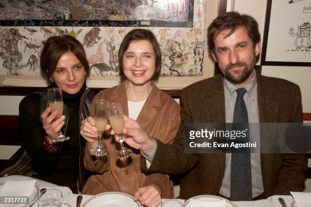 Actress Laura Morante, dinner host Isabella Rossellini and director Nanni Moretti share a toast at the screening after-party for "The Son's Room" at...