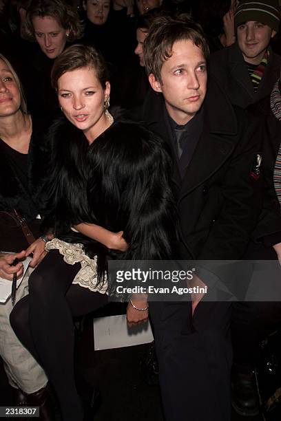 Model Kate Moss with boyfriend Jefferson Hack attending the Marc Jacobs Fall 2002 fashion show at the 26th Street Armory in New York City. 2/11/2002....
