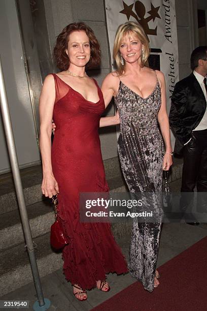 Actress Sigourney Weaver with model Cheryl Tiegs arriving at the 2002 Michael Awards at the Hammerstein Ballroom in New York City. March 11, 2002....