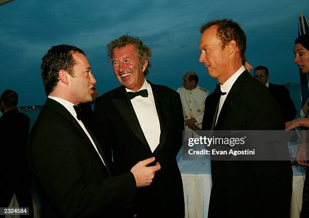 Honcho Colin Callender, New Line Co-Chair Bob Shaye and Actor Michael Keaton at the "About Schmidt" Pre-Premiere party at Carlton Beach during the...