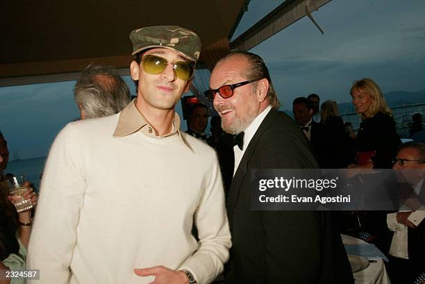Actor Adrien Brody with Jack Nicholson at the "About Schmidt" Pre-Premiere party at Carlton Beach during the 55th Cannes Film Festival in Cannes,...