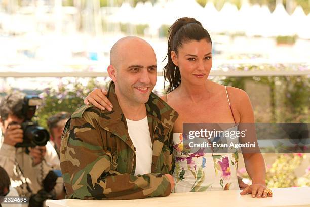 Dir. Gaspar Noe and actress Monica Bellucci at the "Irreversible" photo call during the 55th Cannes Film Festival in Cannes, France. May 24, 2002....