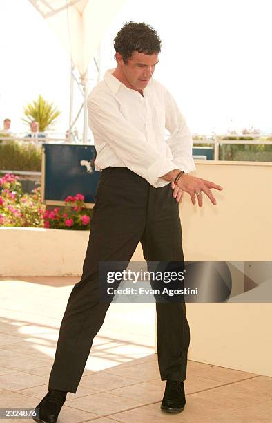 Actor Antonio Banderas acting like a bullfighter at the "Femme Fatale" Photo Call during the 55th Cannes Film Festival in Cannes, France. May 25...